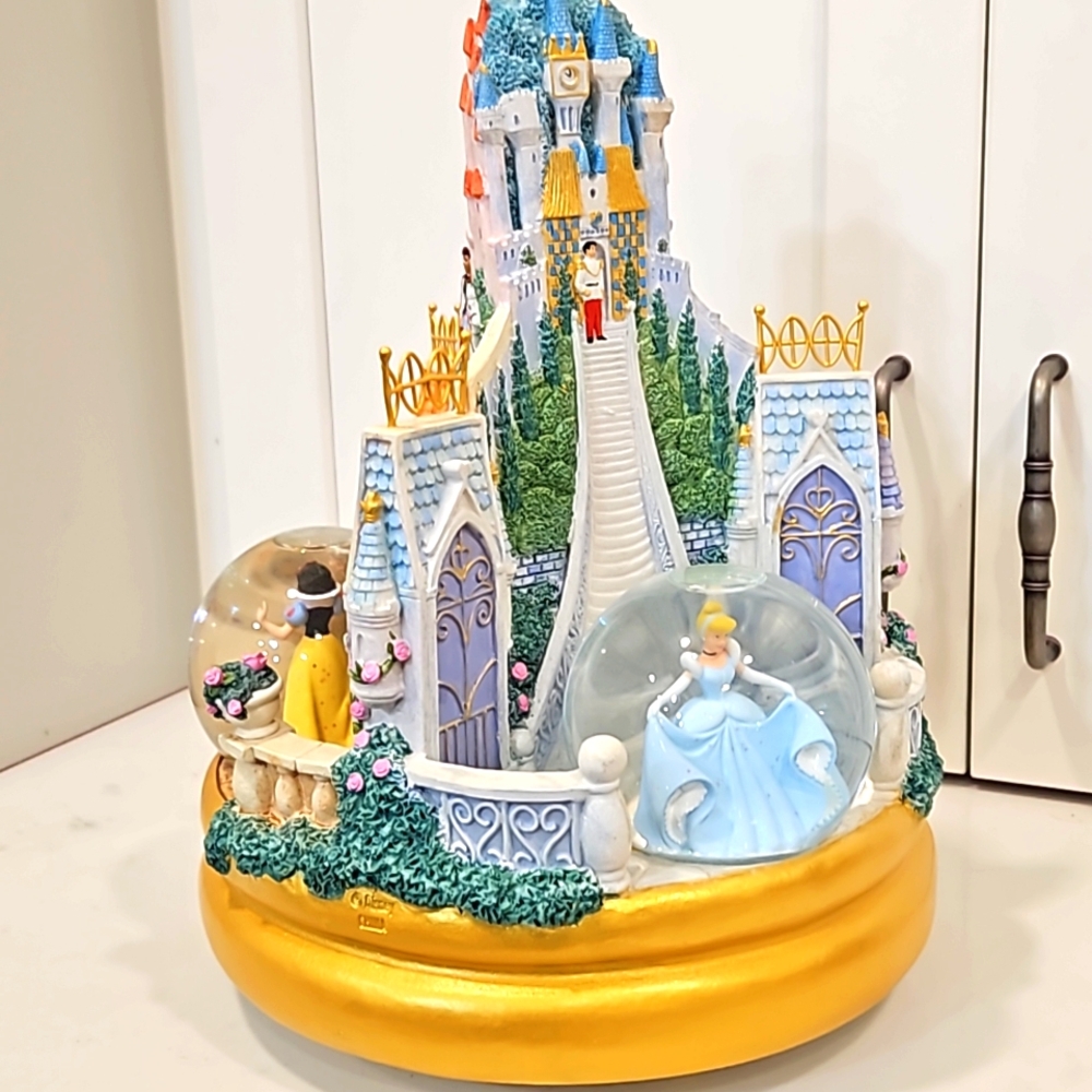Disney  A Wish Your Heart Makes  3 sided rotating figurine w/snow globes.